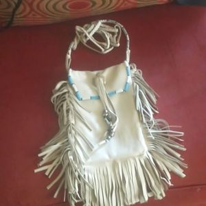 Leather hand made bag with four ft shoulder strape.